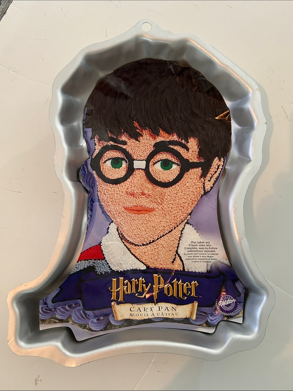 Wilton Harry Potter Character Cake Pan with baking and decorating details